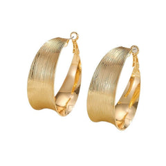 Brushed wide hoop earrings with textured finish – Zilku