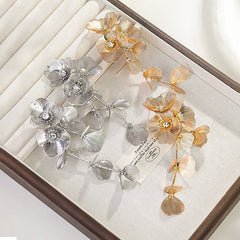 Cascading floral earring with crystal center – Broki