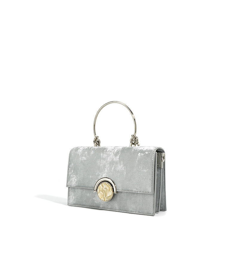 structured velvet top-handle bag with stone clasp – AMORAM
