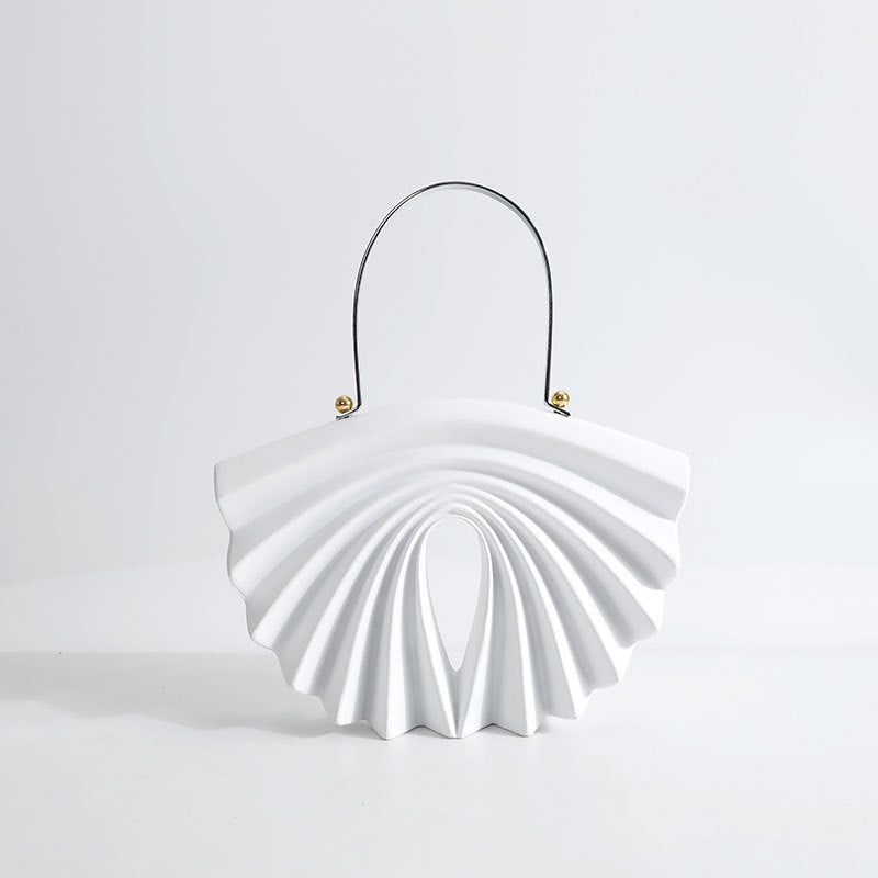 culpted accordion shell bag with metal top handle – LUCIDA