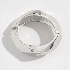 sculptural gold bangle bracelet with folded edge – NOVIA