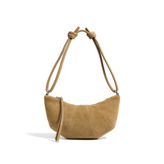 crescent suede shoulder bag with knotted strap – SIENNA