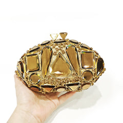 Embellished gemstone clutch with metallic accents - Abrilu