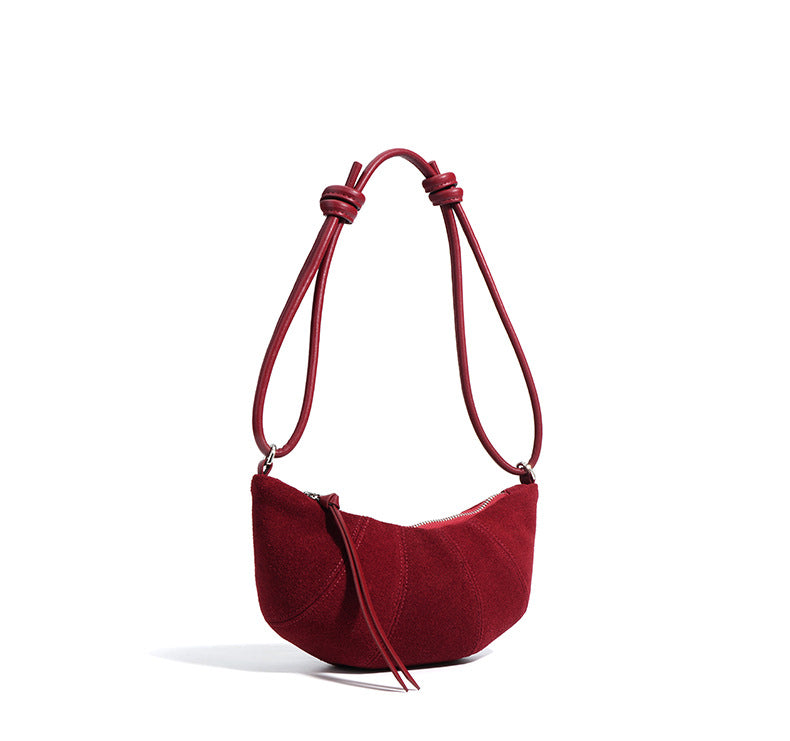 crescent suede shoulder bag with knotted strap – SIENNA