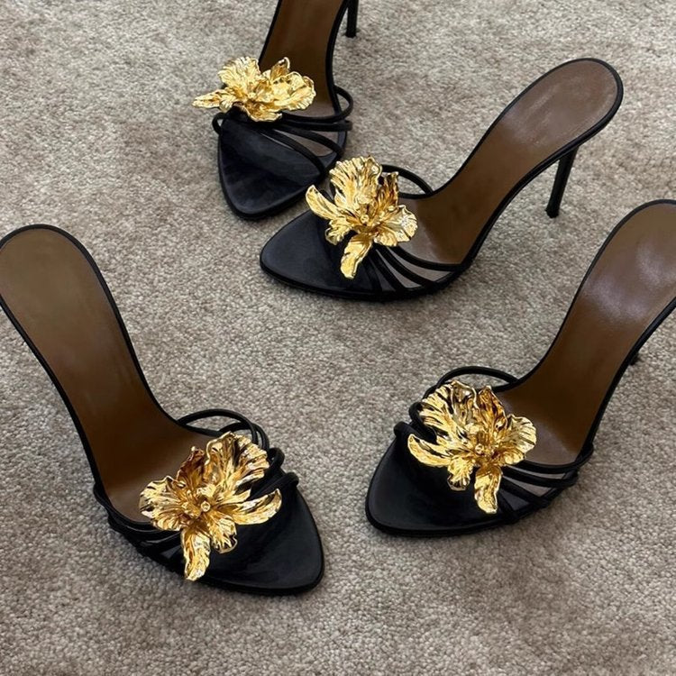 black stiletto mules with gold sculpted flower – CALISTA