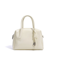 structured mini handbag with knotted charm - DELKA