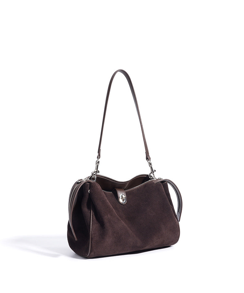 suede shoulder bag with curved zipper detail – TERRA