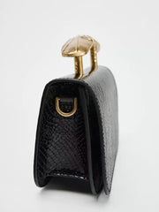 Sleek rectangular handbag with gold handle - Erju
