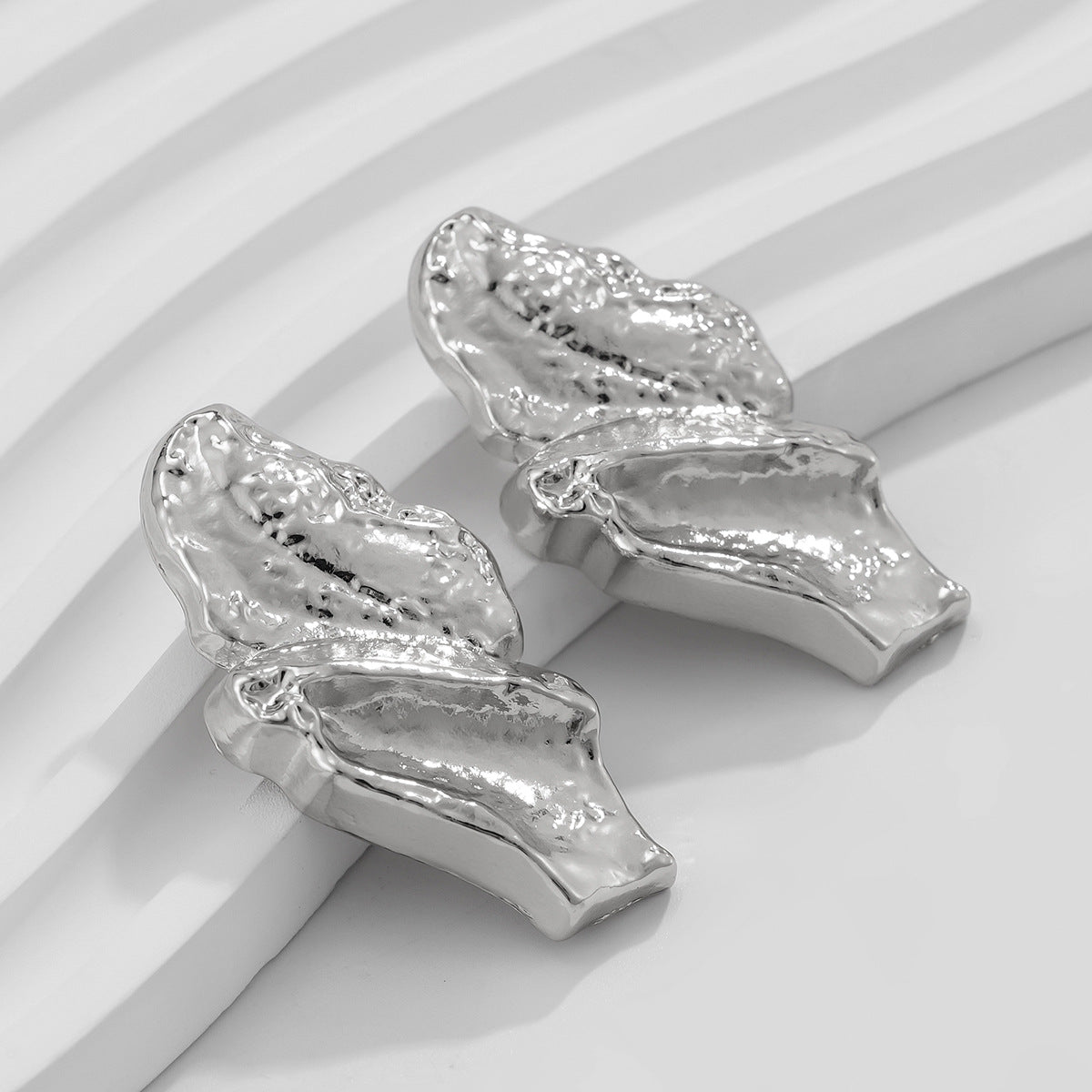 Textured molten double-layer earrings with sculptural finish - Vadvy