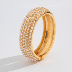pearl-studded gold bangle – LUMI
