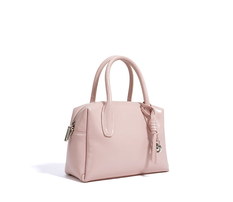 structured mini handbag with knotted charm - DELKA