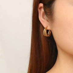Dual-layer textured hoop earrings with engraved detail – Akoma