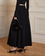 High-waisted pleated skirt with tiered hem - Olji