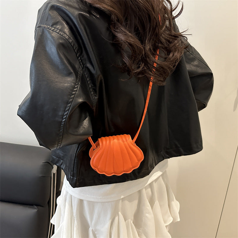 seashell leather crossbody bag in coral orange – MAREA