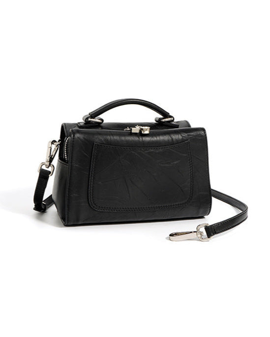 structured trapeze handbag with front patch pocket - NOXIR