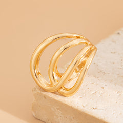 Open triple-loop statement ring with sculptural curve - Nulgi