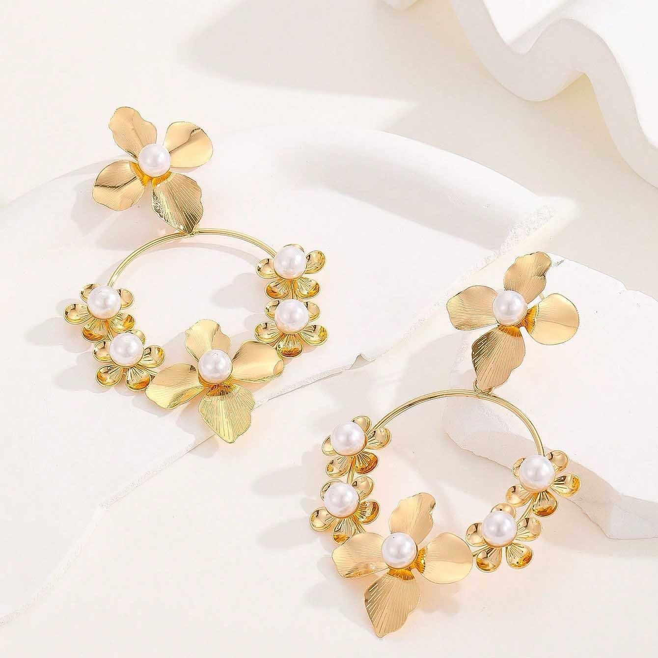 floral hoop earring with blue crystal centers – AURELIA