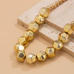 Chunky hexagon bead necklace with glossy gold finish – Nalzu