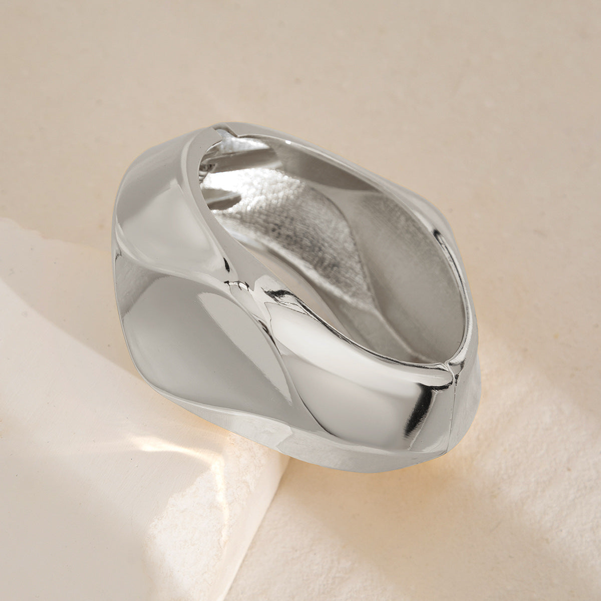 sculptural gold bangle bracelet with folded edge – NOVIA