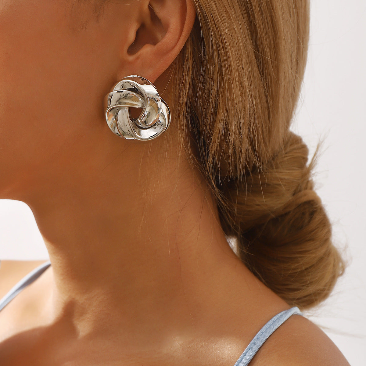 twisted dome stud earrings with polished finish – SELMAR