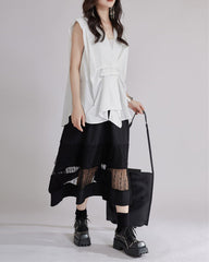 Sleeveless shirt with asymmetrical pleats - Lima