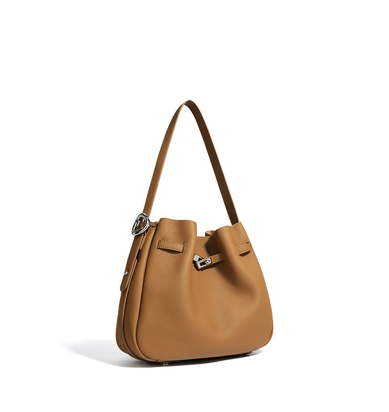 textured leather bucket bag with turn-lock strap – CAMELIA
