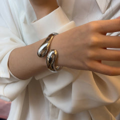sculptural open cuff bracelet in high-shine silver – NUVOLA