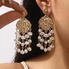 shell drop earrings with textured gold base – CORALIA