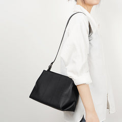 structured shoulder bag with vertical stitching - ORAS