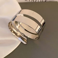 open-cut cuff bracelet in mirror gold bands – VIRELLE