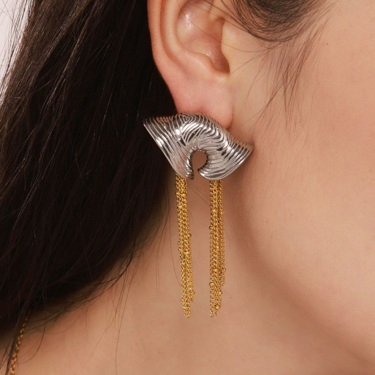 sculpted gold fan earrings with cascading chain tassels – VALINA