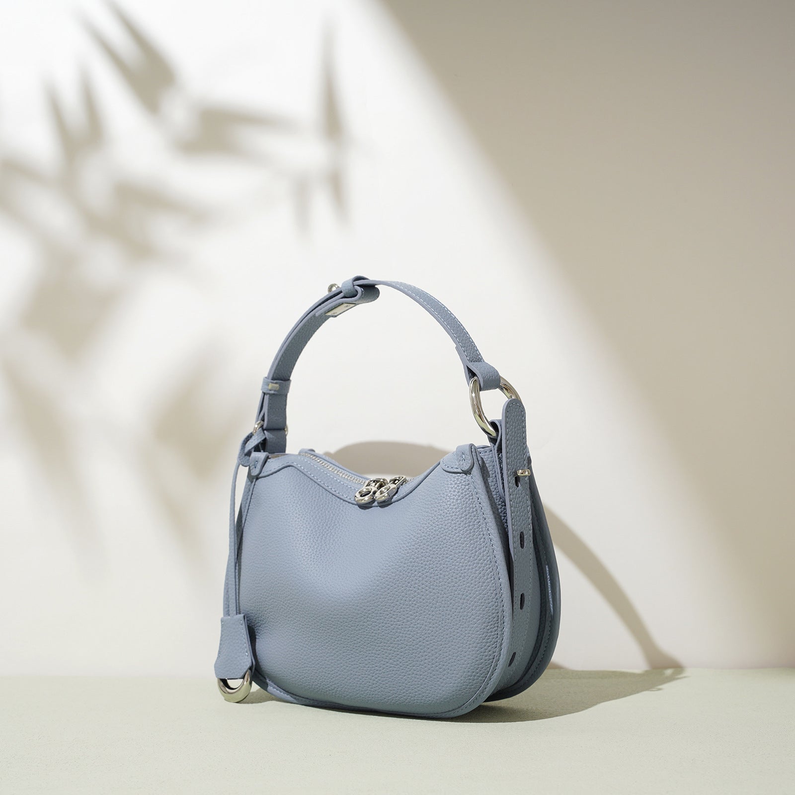 textured leather crescent bag with top handle - LAYLONA