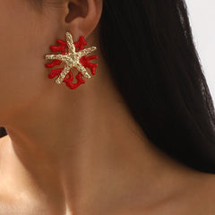 Coral-inspired statement earrings with textured star detail - Cinma