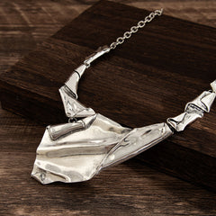 Sculpted metal choker with abstract fold detail - Nighi