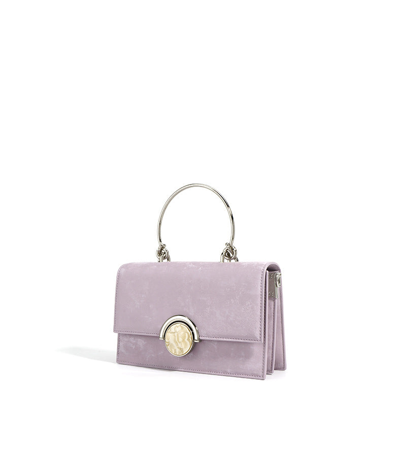 structured velvet top-handle bag with stone clasp – AMORAM