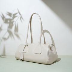 structured barrel shoulder bag in camel – LYRA
