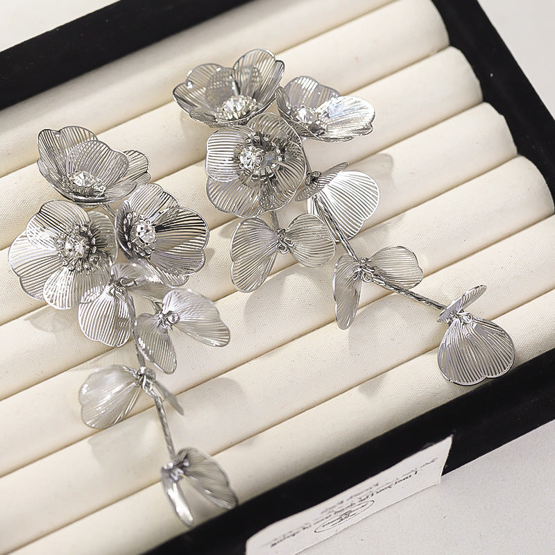 Cascading floral earring with crystal center – Broki
