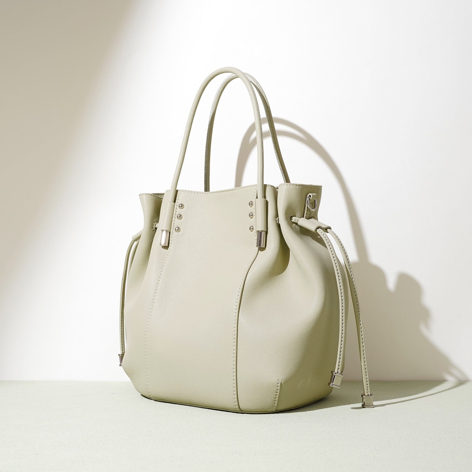 bucket tote bag with metallic drawstring tips – MINTA