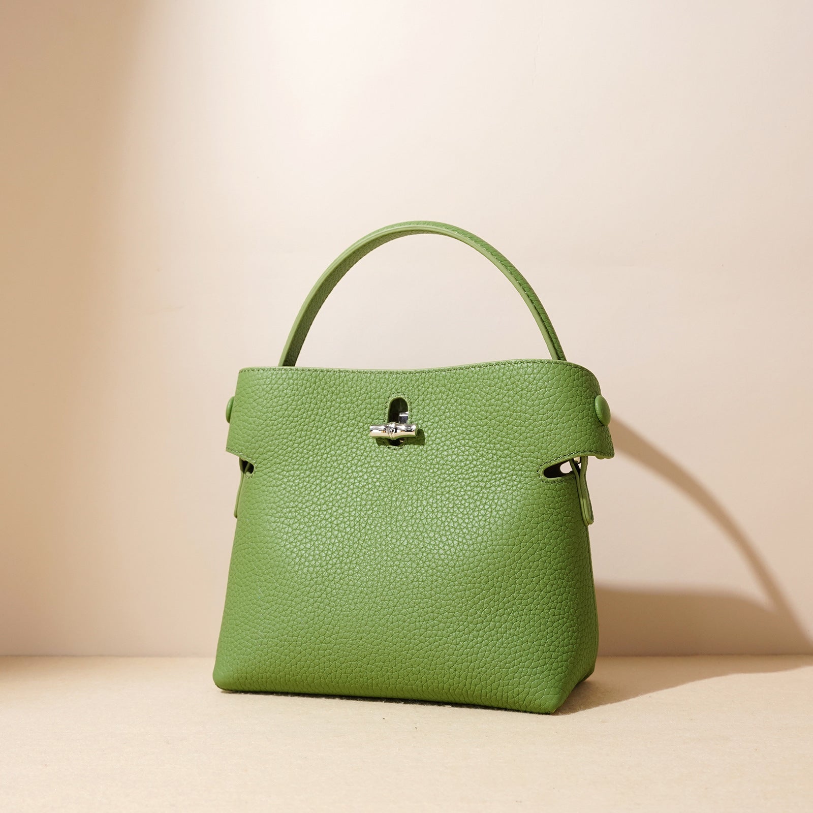 top-handle bucket bag with turn-lock clasp – AZURE