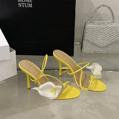 nude stiletto heels with white lily appliqué and green straps – BLOIMA
