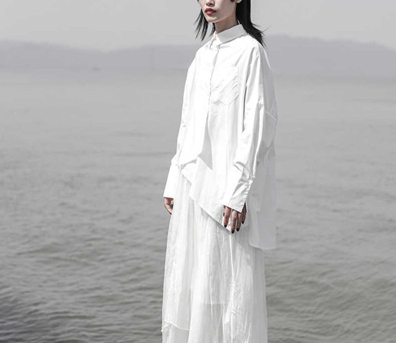 asymmetrical oversized shirt with draped hem - Taura