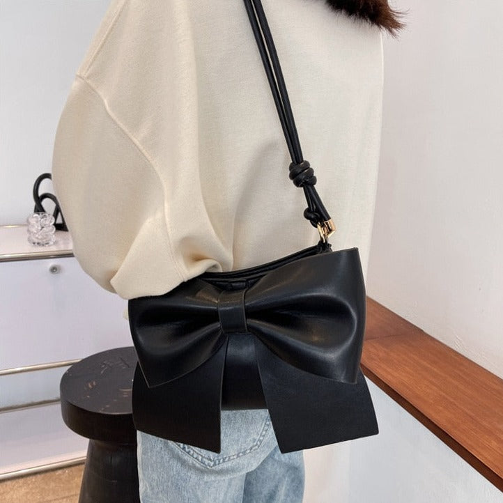 bow-accent crossbody bag with knotted strap - Aegelmaer