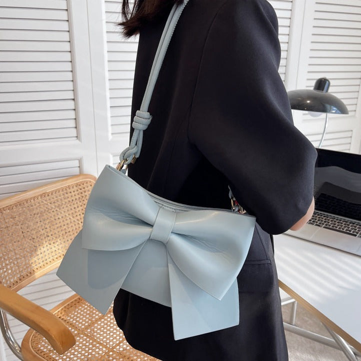 bow-accent crossbody bag with knotted strap - Aegelmaer
