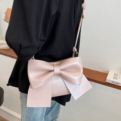 bow-accent crossbody bag with knotted strap - Aegelmaer