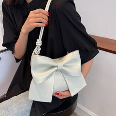 bow-accent crossbody bag with knotted strap - Aegelmaer