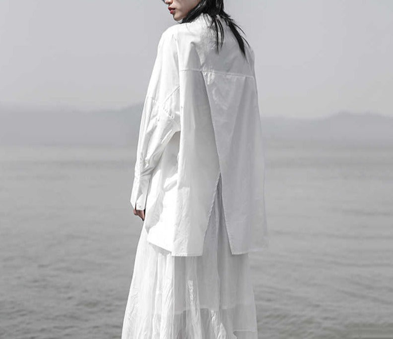 asymmetrical oversized shirt with draped hem - Taura