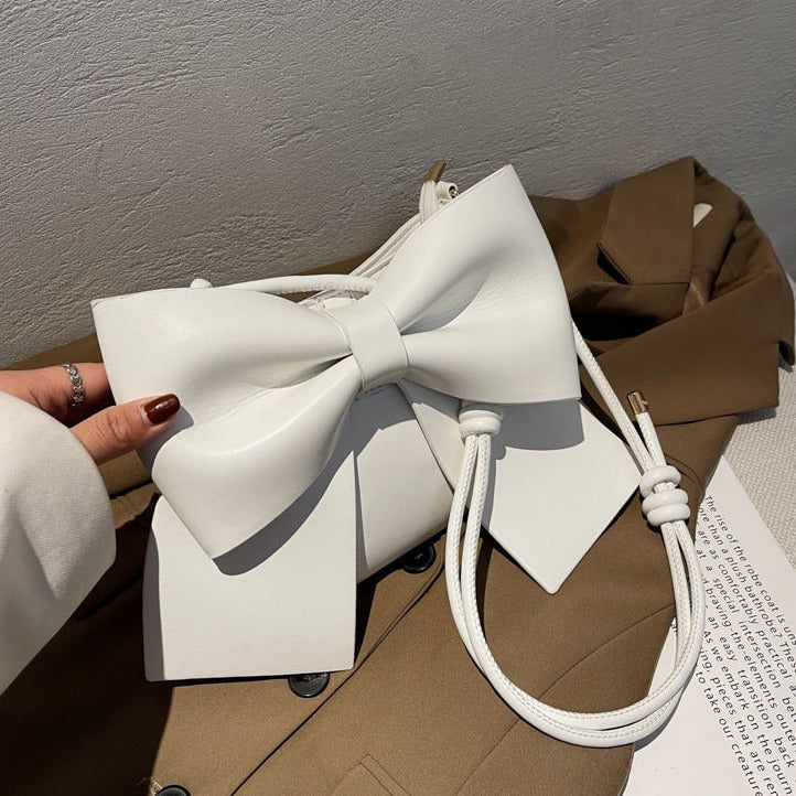 bow-accent crossbody bag with knotted strap - Aegelmaer