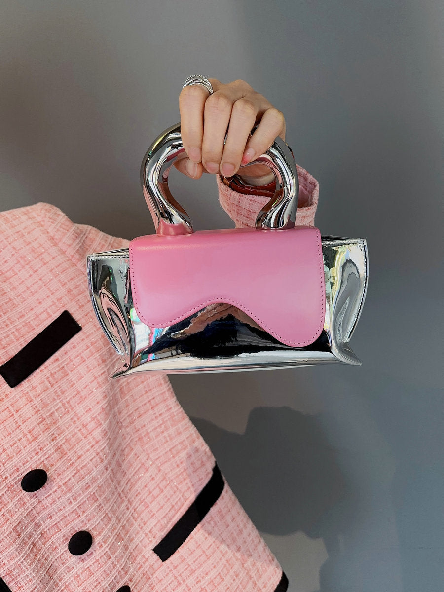 metallic-handle mini clutch with wavy flap - Xiuhtonal