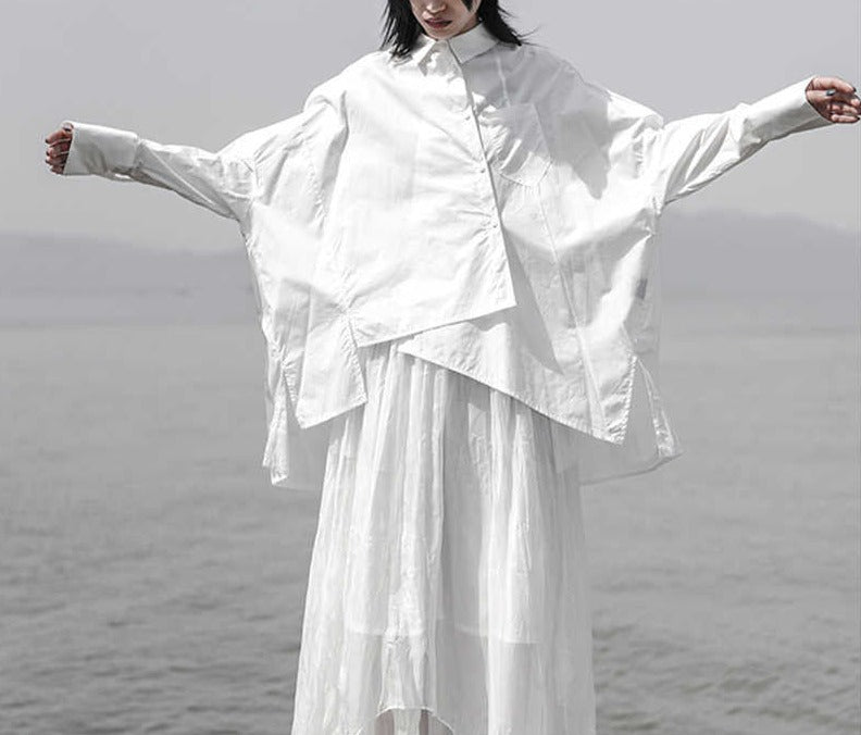 asymmetrical oversized shirt with draped hem - Taura