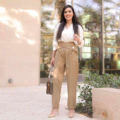 high-waist pleated pants with crossover button detail - Radish